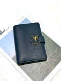 LV Vertical Compact wallet