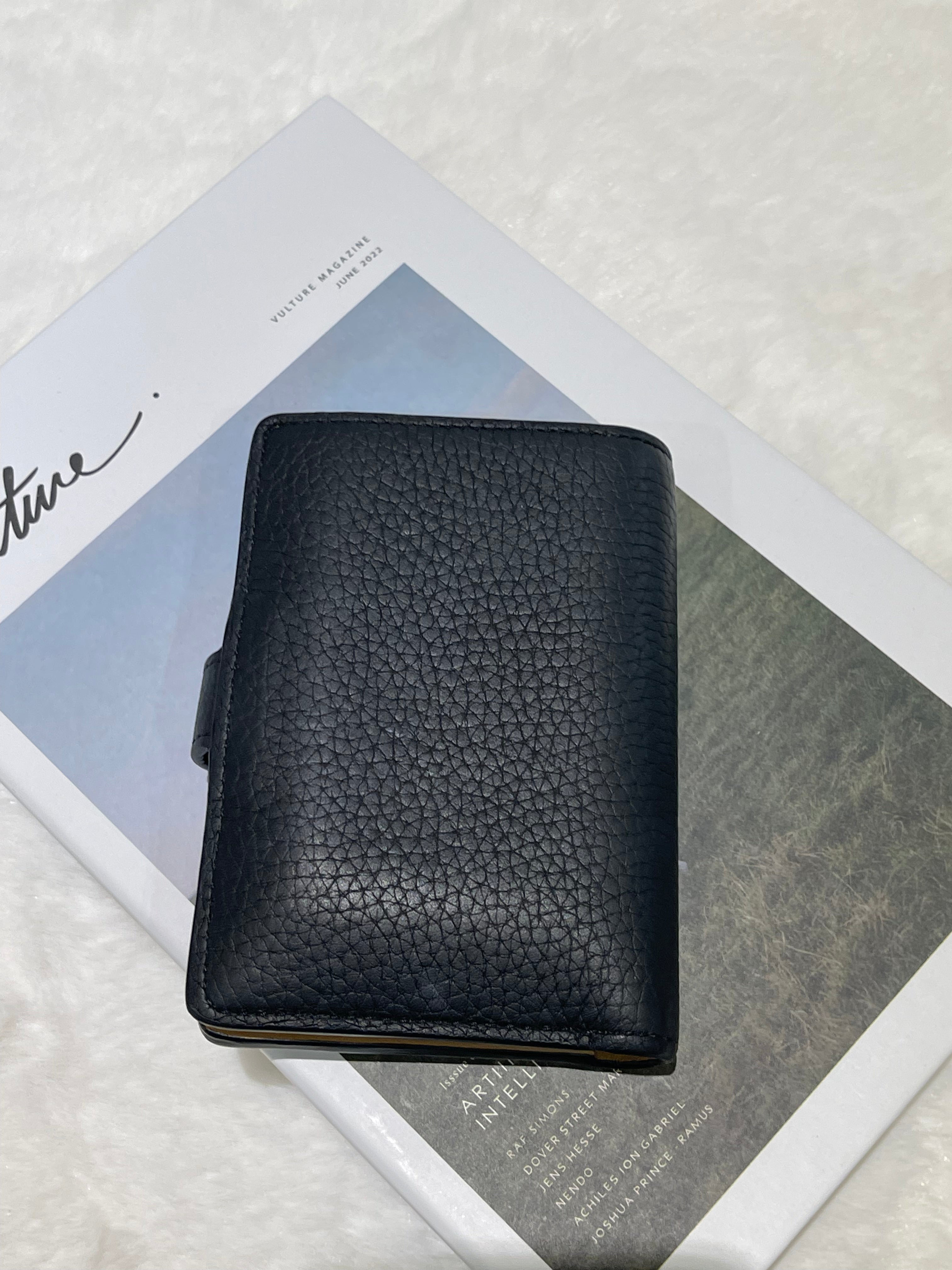 LV Vertical Compact wallet