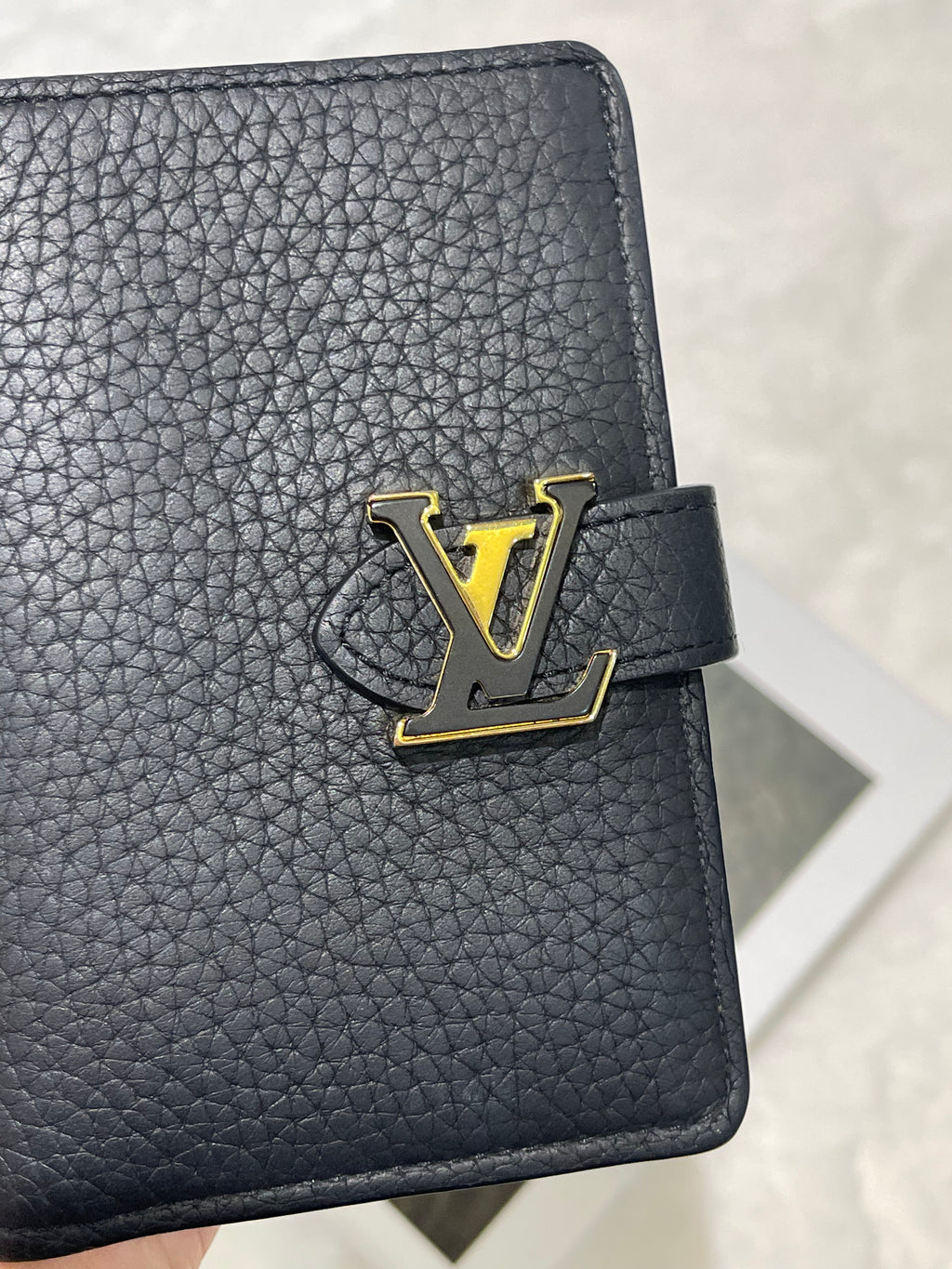 LV Vertical Compact wallet