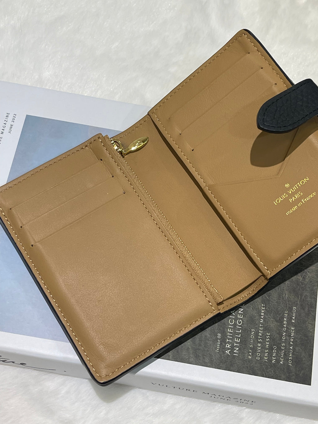 LV Vertical Compact wallet