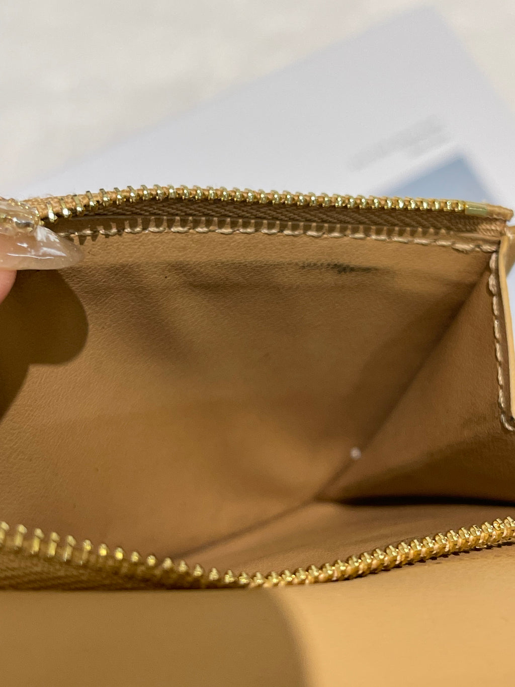 LV Vertical Compact wallet