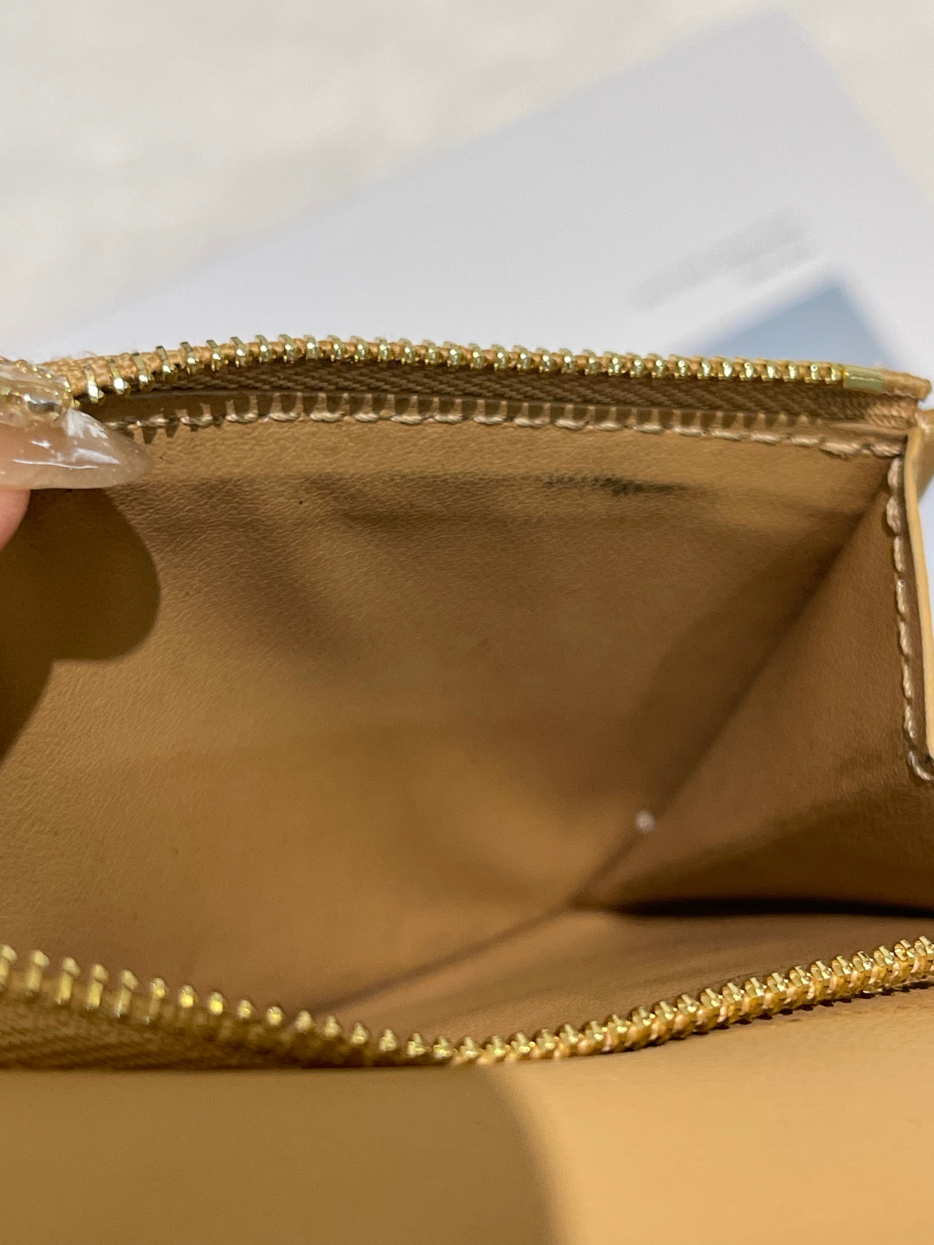 LV Vertical Compact wallet