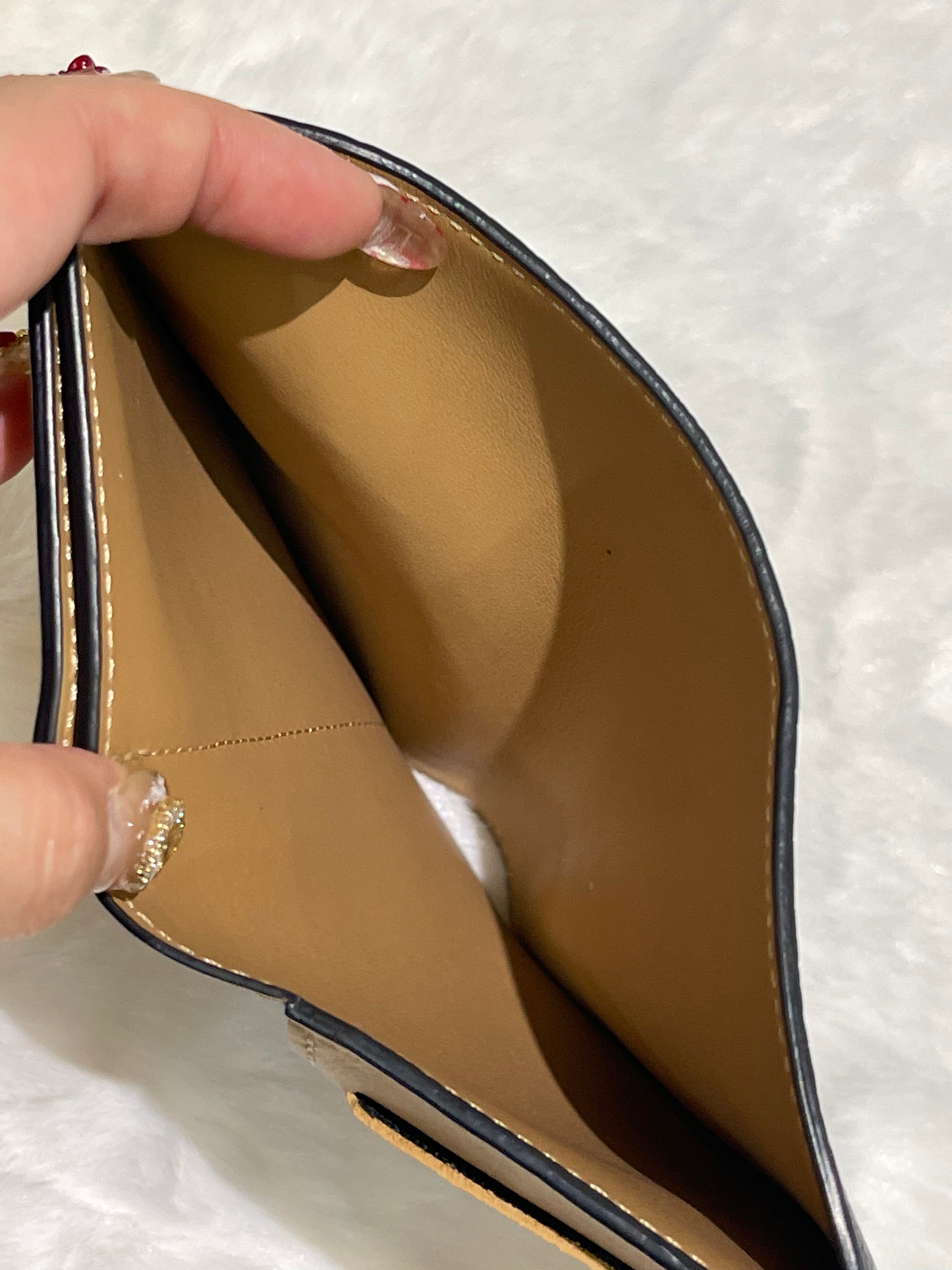 LV Vertical Compact wallet